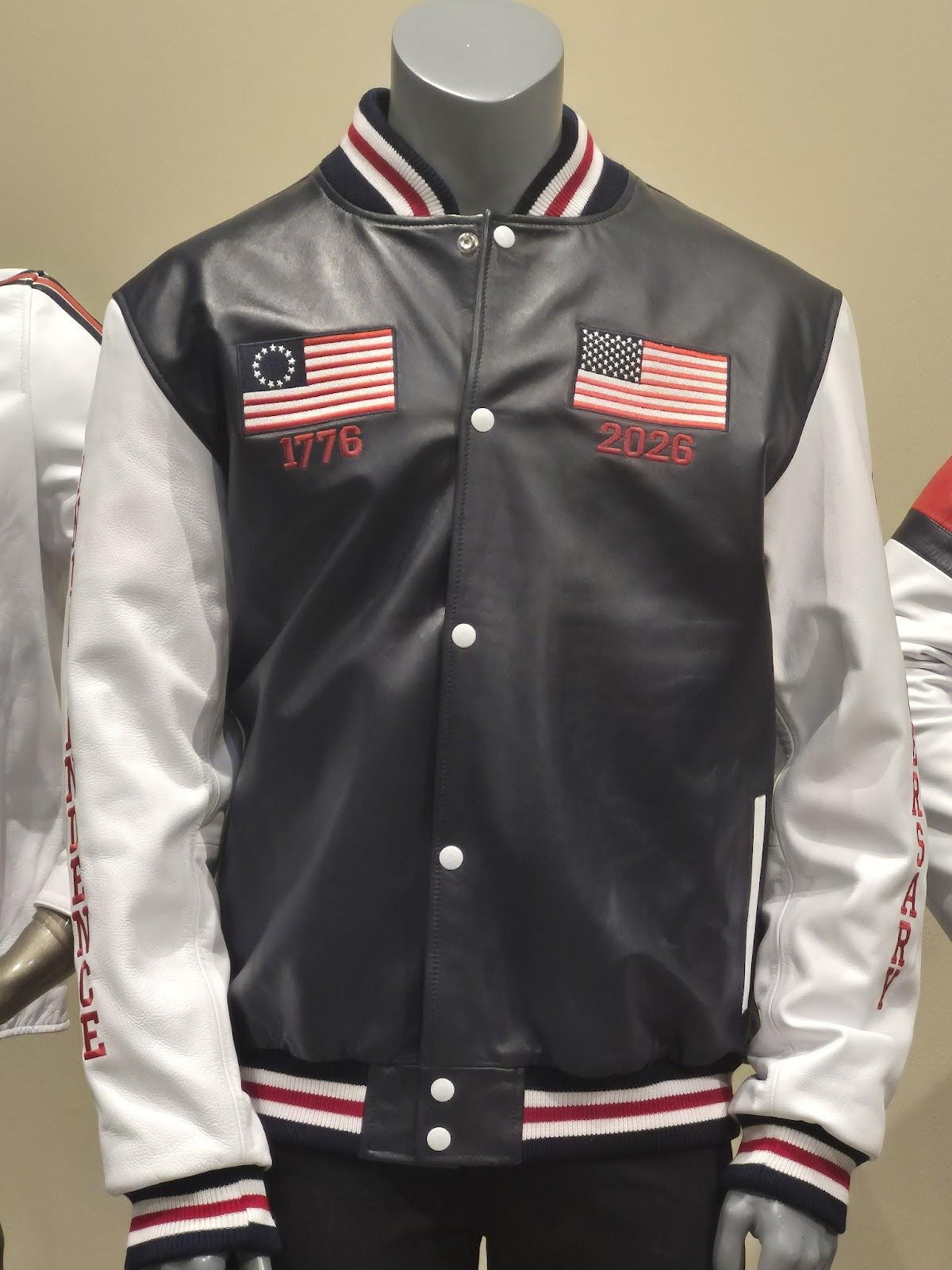 Front view – 1776 and 2026 embroidered flags” | “Right sleeve INDEPENDENCE detail” | “Back eagle crest 250th Anniversary”
